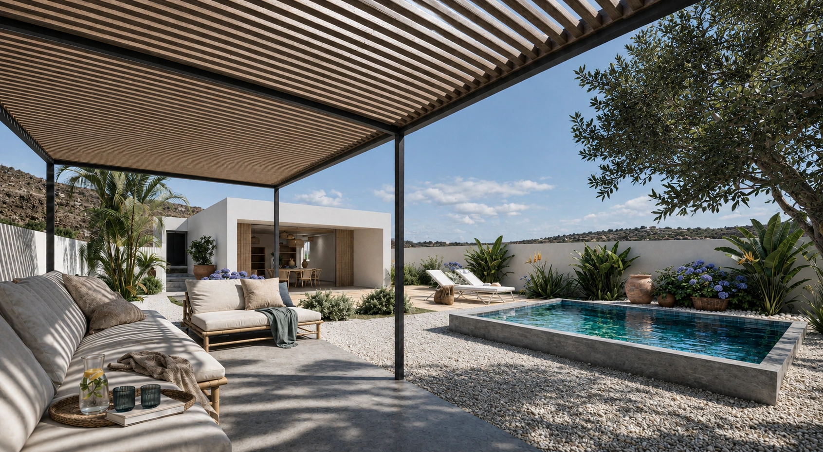 Vista del patio con piscina y pérgola de la vivienda proyectada en Arafo
